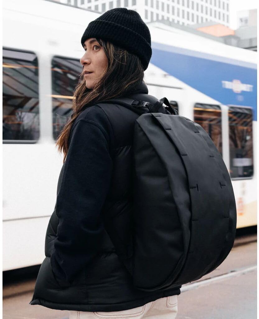 Db Journey The Hugger Backpack - Durable Travel Backpack with Laptop Compartment & Pockets for Work, Luggage Backpack with Roller Bag Hook Up System, 15L - Blackout