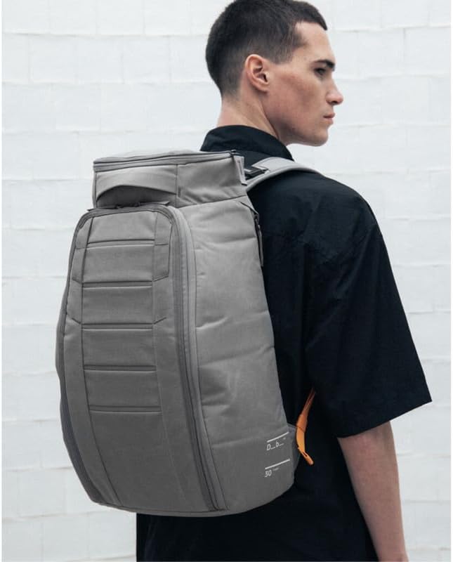 Db Journey The Hugger Backpack - Durable Travel Backpack with Laptop Compartment & Pockets for Work, Luggage Backpack with Roller Bag Hook Up System, 30L - Sand Grey