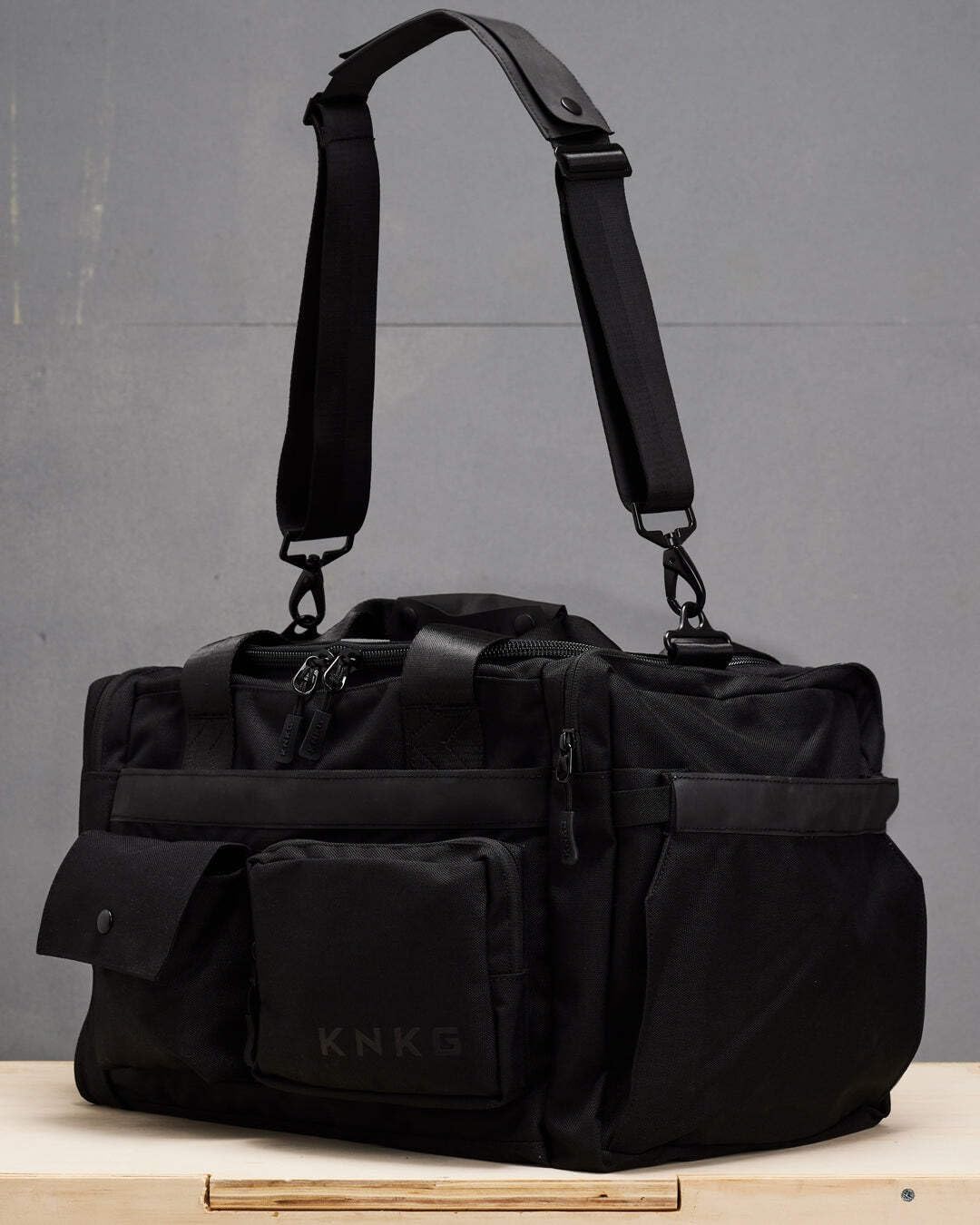 KNKG PLUS 63L Large Duffel Bag – Spacious, Durable Gym Bag with Dual Shoe Storage, Multiple Compartments & YKK Zippers for Fitness & Travel - Redwood (Black, Small 33L)