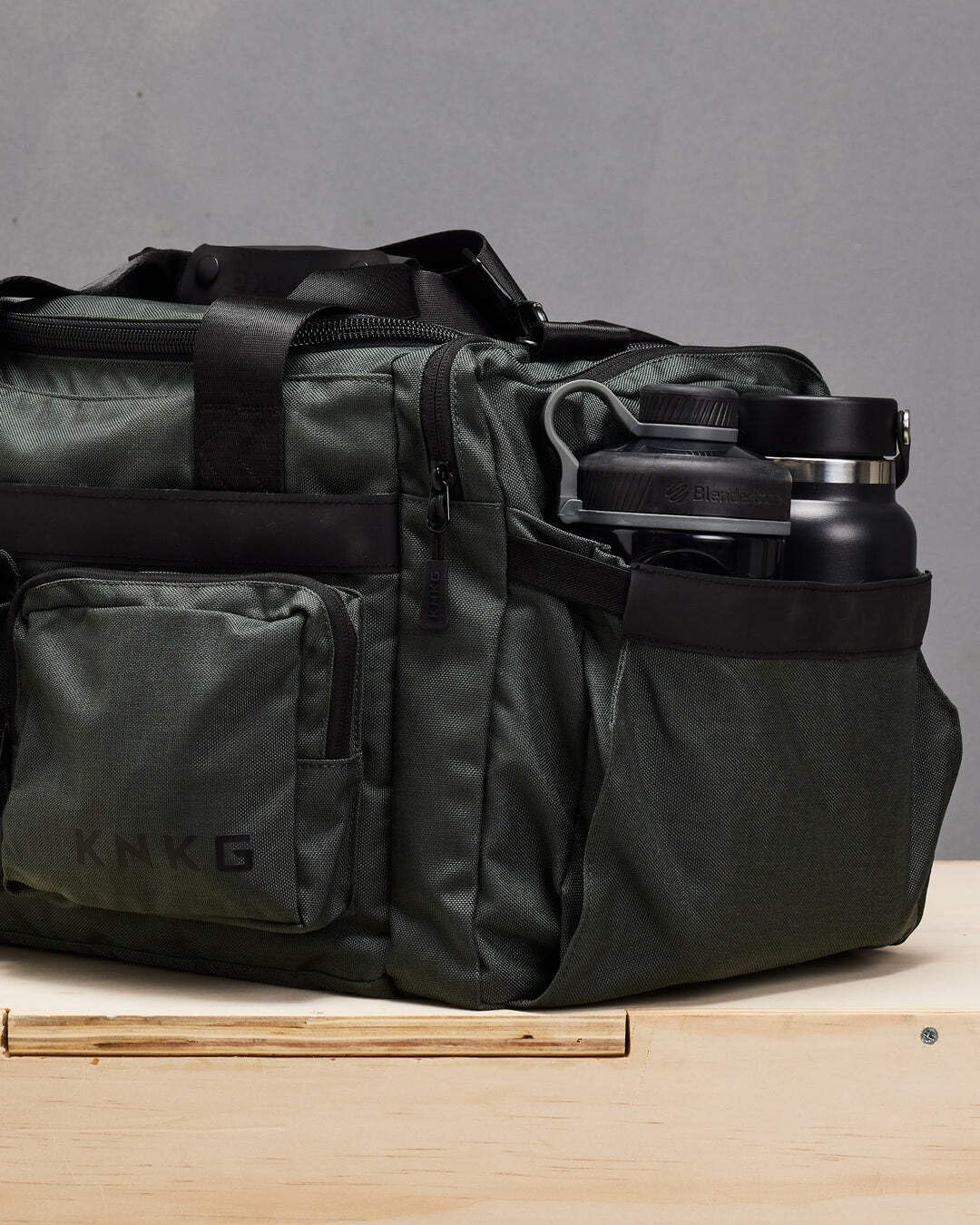PLUS 63L Large Duffel Bag – Spacious, Durable Gym Bag with Dual Shoe Storage, Multiple Compartments & YKK Zippers for Fitness & Travel - Charcoal