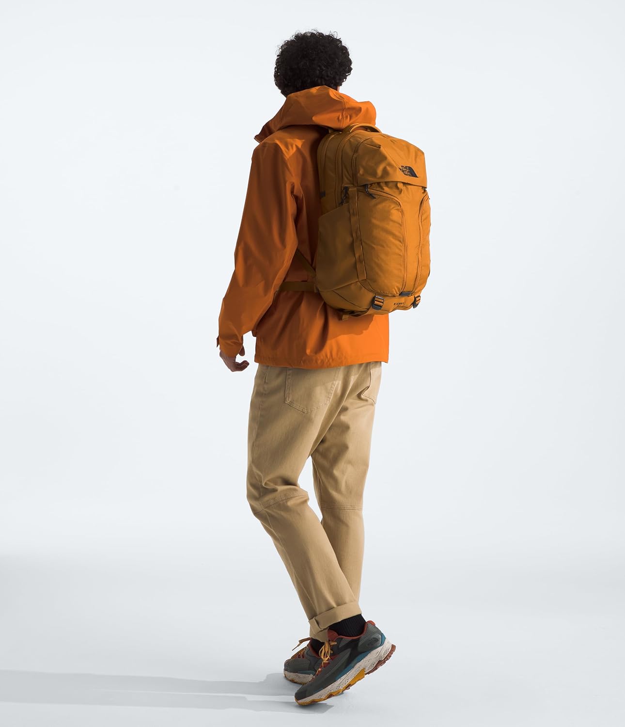 The North Face Surge Commuter Laptop Backpack | Daypack with Water Repellent Finish, 16" Laptop Sleeve, Reflective Details, Timber Tan, One Size