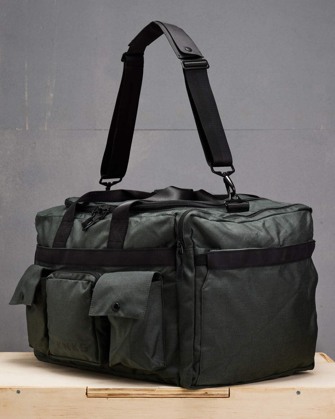 KNKG PLUS 63L Large Duffel Bag – Spacious, Durable Gym Bag with Dual Shoe Storage, Multiple Compartments & YKK Zippers for Fitness & Travel - Redwood (Charcoal, Large 63L)