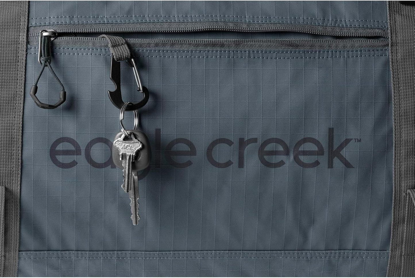 Eagle Creek No Matter What Rolling Duffel - Durable Rolling Bag for Travel - Adjustable Shoulder Strap - Heavy Duty Wheels - Lockable Zippers - Multiple Carry Options - 130L - Smoke
