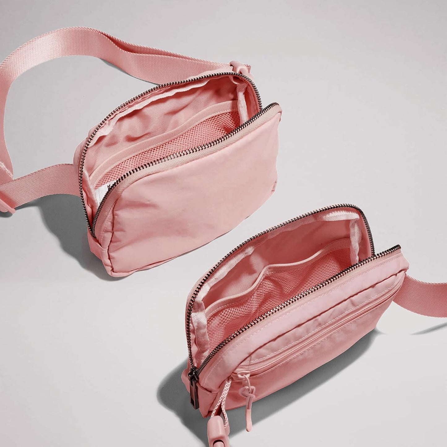 Cross Body Fanny Packs for Women Men Fashion Waist Bag Pouch Nylon Small Travel Crossbody Bags Mini Purse Everywhere Belt Bag Bum Bag with Adjustable Strap for Running Hiking Mono Pink